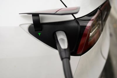 Electric vehicles are set to make up half of new car sales worldwide by 2035, according to Goldman Sachs Research. AP 