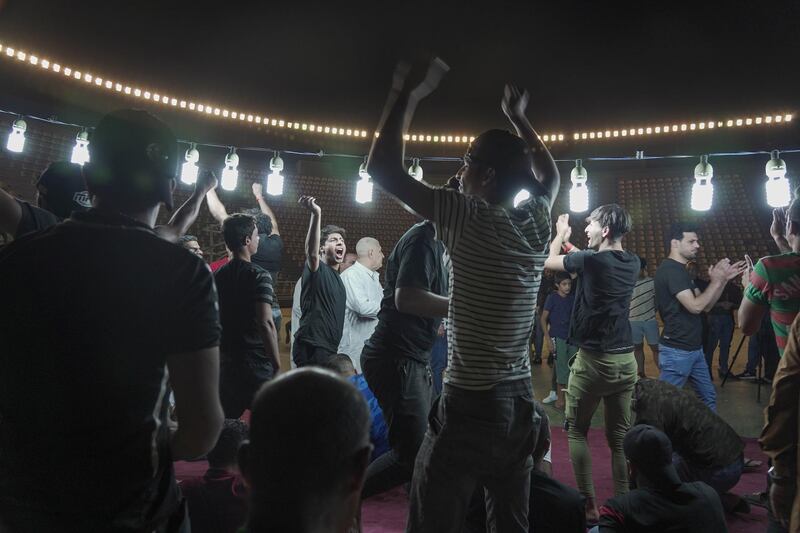 Players celebrate after winning a point against Khadmiyah team during the traditional ring tournament in Baghdad Iraq. Haider Husseini / The National