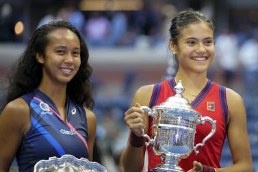 Great Britain's Emma Raducanu holds the trophy as she celebrates winning the women's singles final alongside runner up Canada's Leylah Fernandez on day twelve of the US Open at the USTA Billie Jean King National Tennis Center, Flushing Meadows- Corona Park, New York. Picture date: Saturday September 11, 2021.