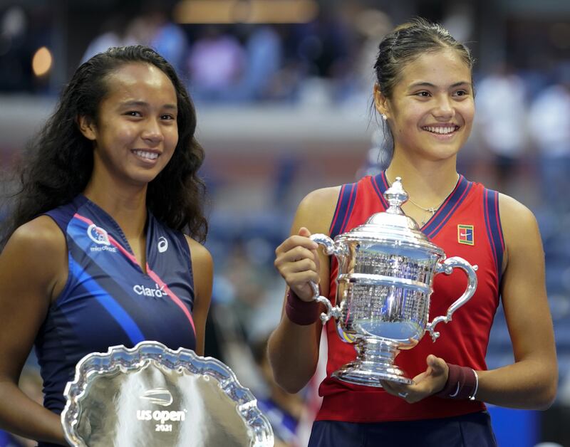 Emma Raducanu celebrates winning the women's singles final alongside runner up Canada's Leylah Fernandez at the US Open, New York, September 11.