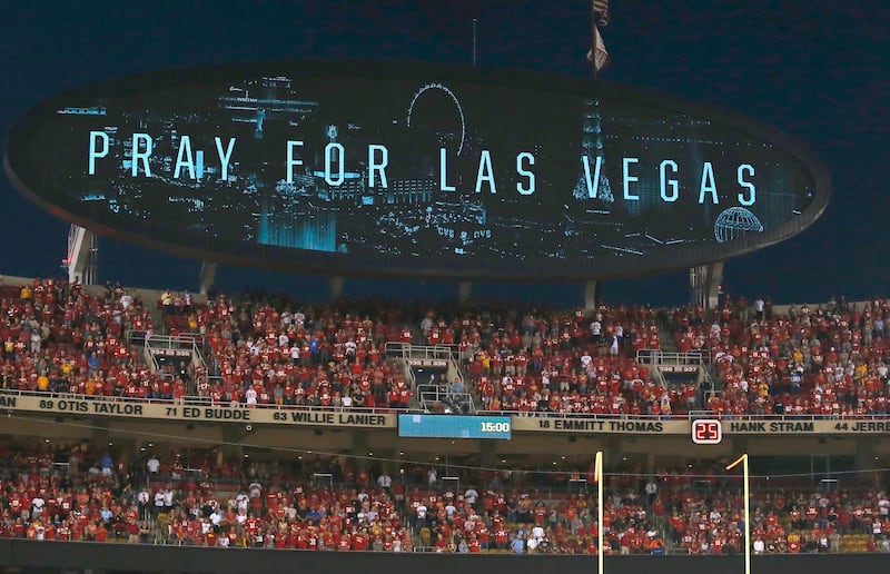 A message on the video board reads 'Pray For Las Vegas' during a moment of silence before the Washington Redskins game against the Kansas City Chiefs at their Monday Night NFL football game at Arrowhead Stadium in Kansas City, Missouri. Larry Smith / EPA