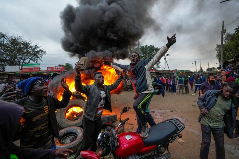 Chanting "No Raila No Peace," supporters of Kenyan opposition leader Raila Odinga burn tyres in the Kibera neighbourhood of the capital Nairobi. AP Photo