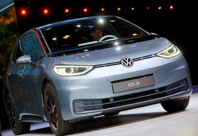 FILE PHOTO: A man drives an ID.3 pre-production prototype car during the presentation of Volkswagen's new electric car on the eve of the International Frankfurt Motor Show IAA in Frankfurt, Germany September 9, 2019. REUTERS/Wolfgang Rattay/File Photo