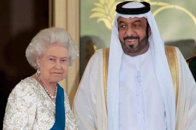 ABU DHABI, UAE - NOVEMBER 25:  Britain's Queen Elizabeth accompanied by HRH The Duke of Edinburgh, Prince Philip in Abu Dhabi on the State Visit to the UAE. The Queen attends an official State Lunch at the Mushrif Palace hosted by HH President Sheikh Khalifa bin Zayed Al Nahyan and members of the ruling family.
