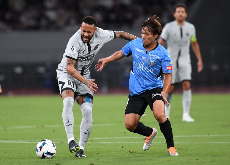 PSG attacker Neymar under pressure from Kenta Tachibanada of Kawasaki Frontale. Getty