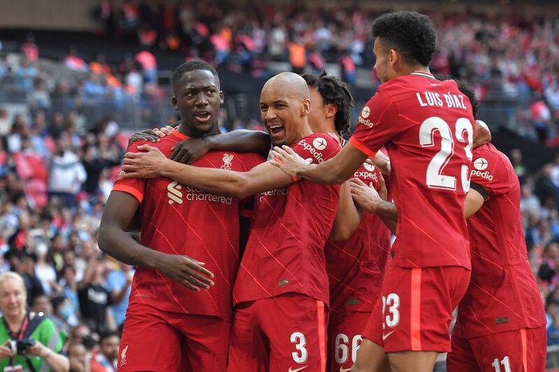 Liverpool players celebrate after Ibrahima Konate scores the opening goal in the 3-2 FA Cup semi-final win against Manchester City at Wembley Stadium on April 16. EPA