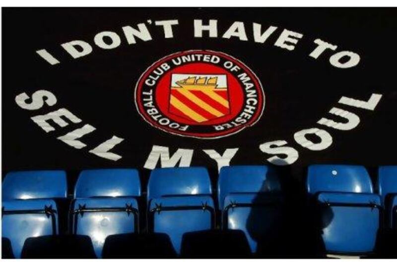 An FC United flag flies at their ground.