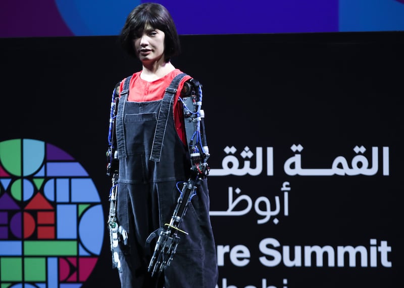 Artificial intelligence-powered robot artist Ai-Da at the Culture Summit in Abu Dhabi. Ai-Da's work reflects human aesthetic tastes and the conditions by which they are shaped. 