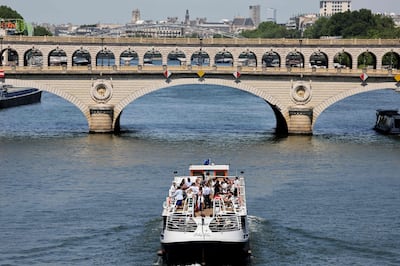 A cruise boat sails on the Seine river. AFP