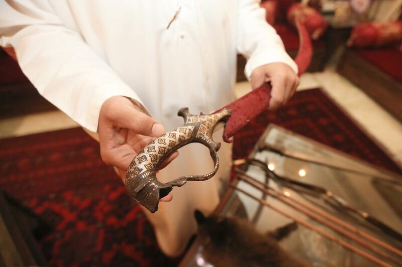 A 200-year-old Indian sword with intricate engravings and paintings engraved on it. Sarah Dea/The National