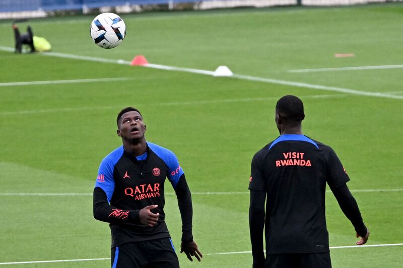 PSG defender Nuno Mendes takes part in a training session. AFP