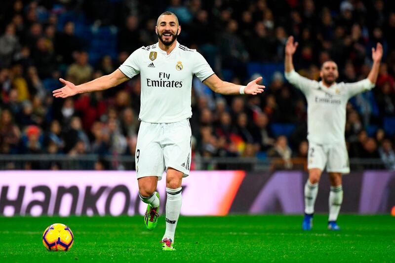 Real Madrid forward Karim Benzema celebrates after scoring against Rayo Vallecano. AFP