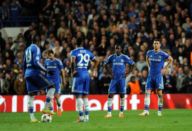 Chelsea players react after losing to Atletico Madrid in the Champions League semi-final on Wednesday. Andy Rain / EPA / April 30, 2014