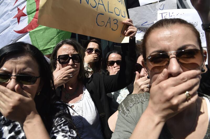 Demonstrators gather during a protest by state TV employees against censorship in the capital Algiers, Algeria. AFP