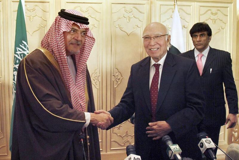 The Saudi foreign minister Prince Saud Al Faisal, left, met Sartaj Aziz, Pakistan's special adviser on national security and foreign affairs, in Islamabad on January 7 as the two countries stepped up high-level contacts. Anjum Naveed / AP Photo