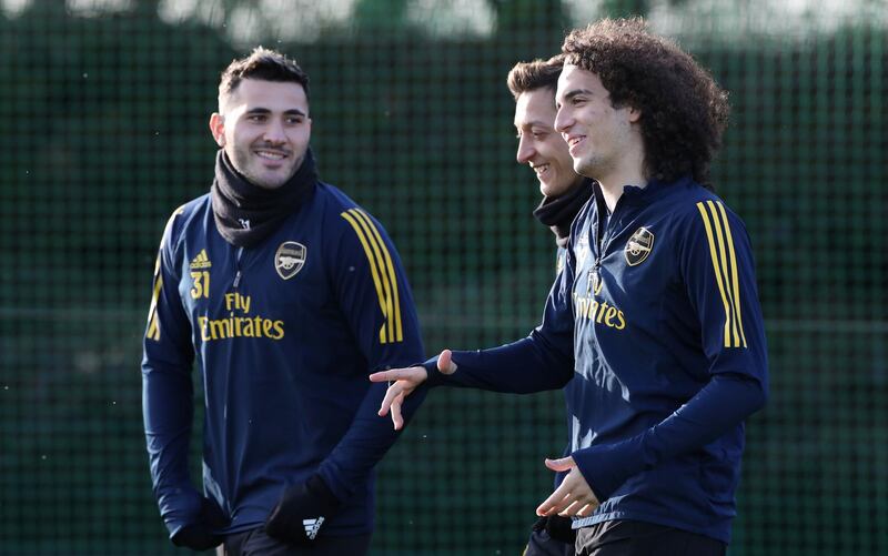 Arsenal's (left-right) Sead Kolasinac, Mesut Ozil and Matteo Guendouzi. PA