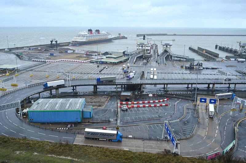 (FILES) In this file photo taken on January 04, 2021 a lorries enter the Port of Dover, southeast England following Britain's departure from the European Union. Exports of British goods to the European Union collapsed by a record 41 percent in January after the nation finalised its divorce from the bloc, official data showed on March 12, 2021. / AFP / Glyn KIRK
