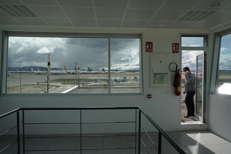 Airport general manager Alejandro Ibrahim speaks on his phone at Teruel airport. Reuters