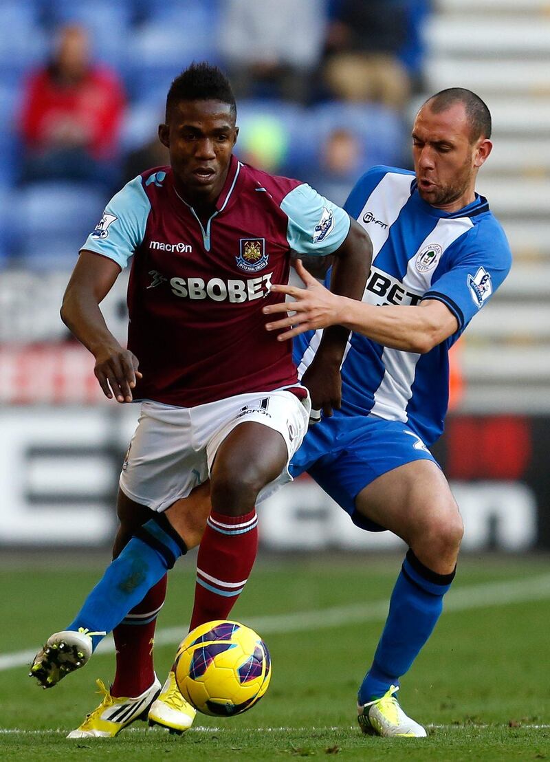 WIGAN, ENGLAND - OCTOBER 27:  Ivan Ramis (R) of Wigan in action with Modibo Maiga of West Ham during the Barclays Premier League match between Wigan Athletic and West Ham United at the DW Stadium on October 27, 2012 in Wigan, England. (Photo by Paul Thomas/Getty Images) *** Local Caption ***  154834864.jpg