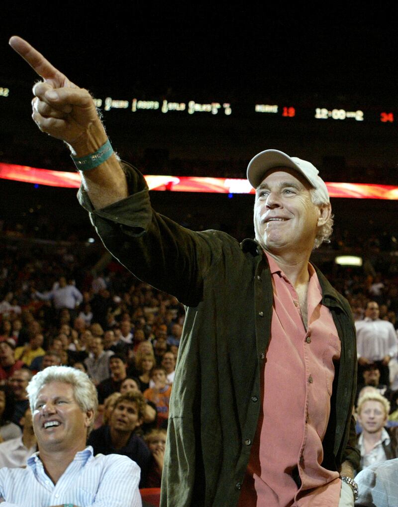 Jimmy Buffett attends an NBA basketball game between Miami Heat and the Dallas Mavericks in Miami, Florida in November 2004. Reuters