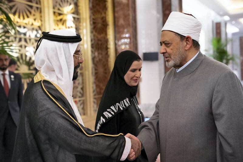 ABU DHABI, UNITED ARAB EMIRATES - February 3, 2019: Day one of the UAE Papal visit - HH Sheikh Tahnoon bin Mohamed Al Nahyan, Ruler's Representative in Al Ain Region (L)greets  His Eminence Dr Ahmad Al Tayyeb, Grand Imam of the Al Azhar Al Sharif (R), at the Presidential Airport. 

( Ryan Carter / Ministry of Presidential Affairs )
---