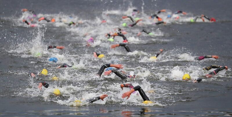 Athletes compete in the women's elite race of the Hamburg Wasser World Triathlon in Hamburg, northern Germany, Saturday, September 5.  EPA