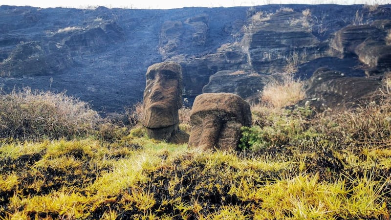 Moai statues in Easter Island, Chile, were damaged after a wildfire. Reuters 