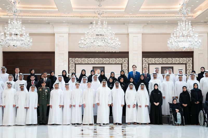 ABU DHABI, UNITED ARAB EMIRATES - July 17, 2019: HH Sheikh Mohamed bin Zayed Al Nahyan, Crown Prince of Abu Dhabi and Deputy Supreme Commander of the UAE Armed Forces (front row 9th L) stands for a photograph with the honors and outstanding students of Grade 12 and their parents, at Al Bateen Palace. Seen with HH Major General Pilot Sheikh Ahmed bin Tahnoon bin Mohamed Al Nahyan, Chairman of the National and Reserve Service Authority (front row 4th L) and HE Hussain Ibrahim Al Hammadi, UAE Minister of Education (front row 10th L).

( Mohamed Al Hammadi / Ministry of Presidential Affairs )
---