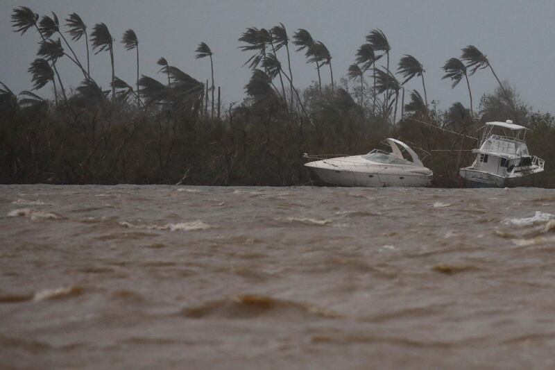 Damaged boats are seen after the area was hit by Hurricane Maria in Puerto de Jobos, Puerto Rico. Carlos Garcia Rawlins / Reuters