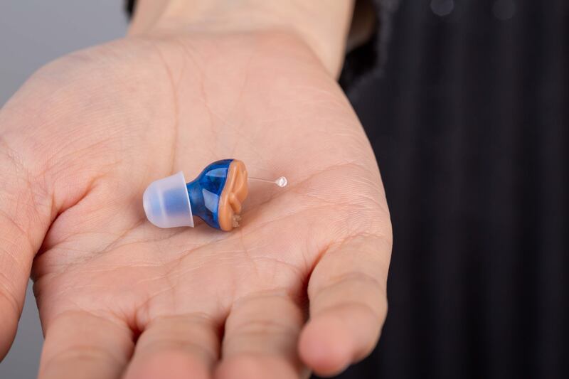 Hearing aids have progressed from chunky gadgets to discreet buds that can be inserted within the ear cavity. Getty Images