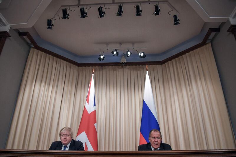 Russian foreign minister Sergei Lavrov and British foreign secretary Boris Johnson following their meeting in Moscow. Yuri Kadobnov / AFP Photo