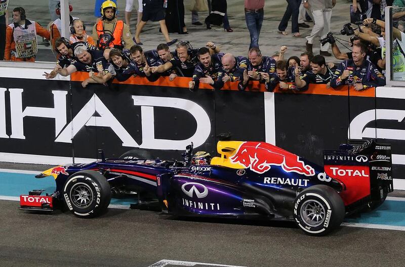 Sebastian Vettel celebrates with his Red Bull Racing crew after winning the Abu Dhabi Grand Prix at the Yas Marina Circuit on Sunday. Ali Haider / EPA