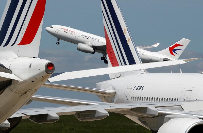 FILE PHOTO: A passenger aircraft of China Eastern Airlines takes off at Paris Charles de Gaulle airport in Roissy-en-France during the outbreak of the coronavirus disease (COVID-19) in France May 19, 2020.  REUTERS/Charles Platiau/File Photo