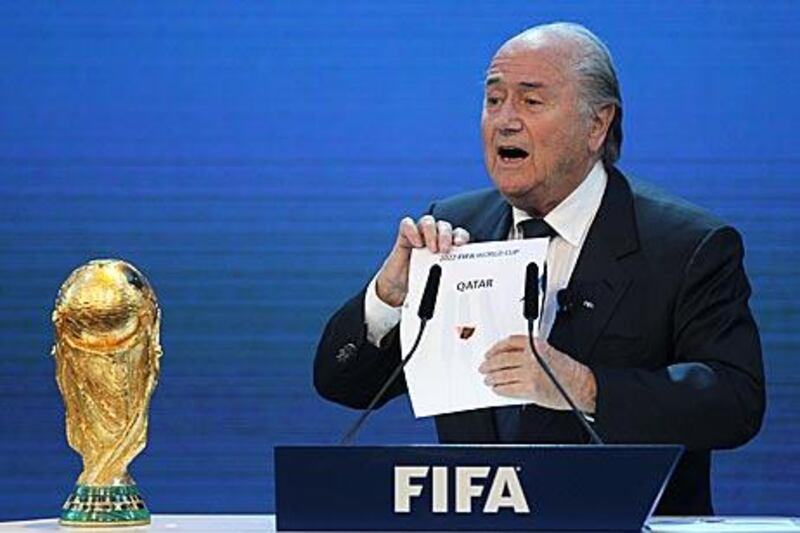 Sepp Blatter, the Fifa president, announces Qatar's successful bid to host for the 2022 World Cup.
