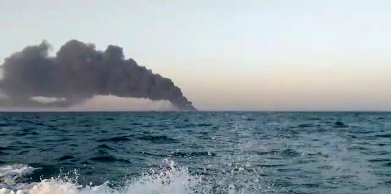 The Iranian navy support ship burns in still from a video. Asriran.com via AP