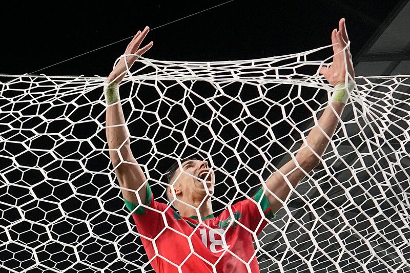 Morocco's Jawad El Yamiq taking out his frustrations after a missed chance against Spain. AP Photo