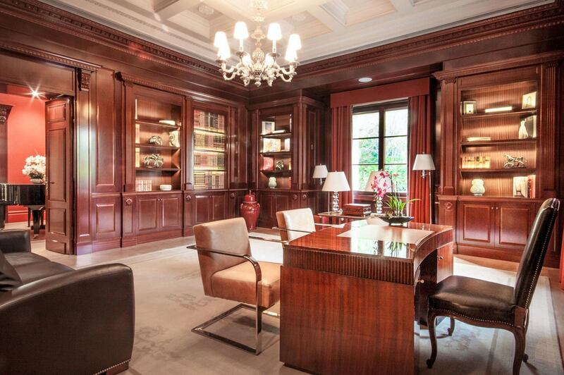 The wood-lined study is ready for serious business. Courtesy Luxhabitat