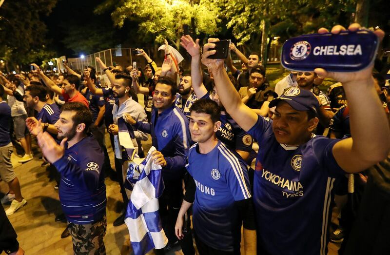 Chelsea fans cheer as the Chelsea squad arrive in Baku ahead of the Europa League final. Reuters