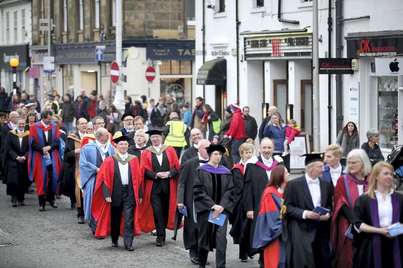 Academics take part in the procession through the streets of St Andrews, Fife, after Serbian political activist Srdja Popovic was installed as the new rector at the University of St Andrews. (Photo by Jane Barlow/PA Images via Getty Images)