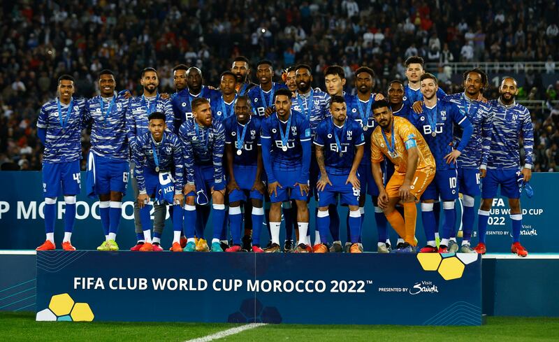 Al Hilal players pose with their second-place medals after  the Fifa Club World Cup final. Reuters