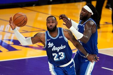 LeBron James earned a triple-double in the Los Angeles Lakers' come-from-behind win over the Denver Nuggets. AP