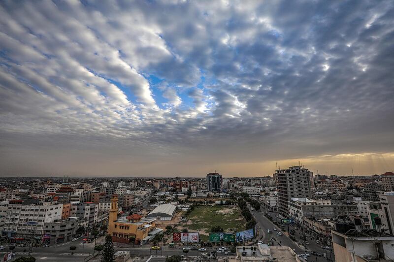 A panoramic view of clouds over Gaza City at sunset.  EPA
