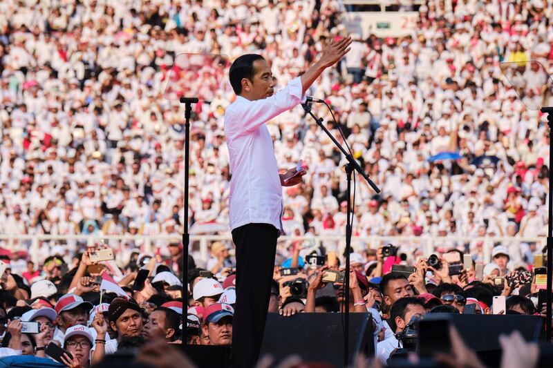JAKARTA, INDONESIA - APRIL 13: Indonesian President Joko Widodo, popularly known as Jokowi, gives a speech to supporters at a rally at Jakarta's main stadium on April 13, 2019 in Jakarta, Indonesia. Indonesia's general elections will be held on April 17 pitting incumbent President Joko Widodo against Prabowo who he defeated in the last election in 2014.(Photo by Ed Wray/Getty Images)