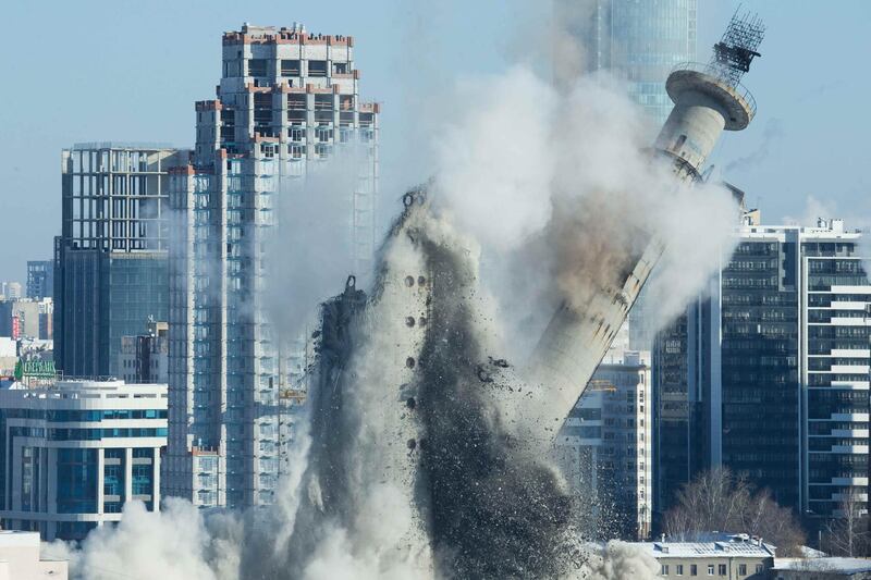 An unfinished and abandoned TV tower collapses during a controlled demolition in Yekaterinburg, Russia. Alexei Kolchin / Reuters
