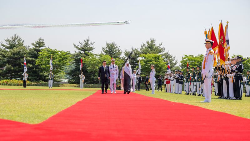 Sheikh Mohamed and Mr Yoon inspect the guard of honour.
Abdulla Al Neyadi / UAE Presidential Court 