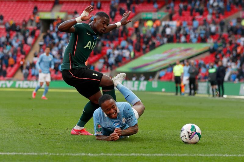 Tottenham's Serge Aurier fouls Raheem Sterling of City. AP