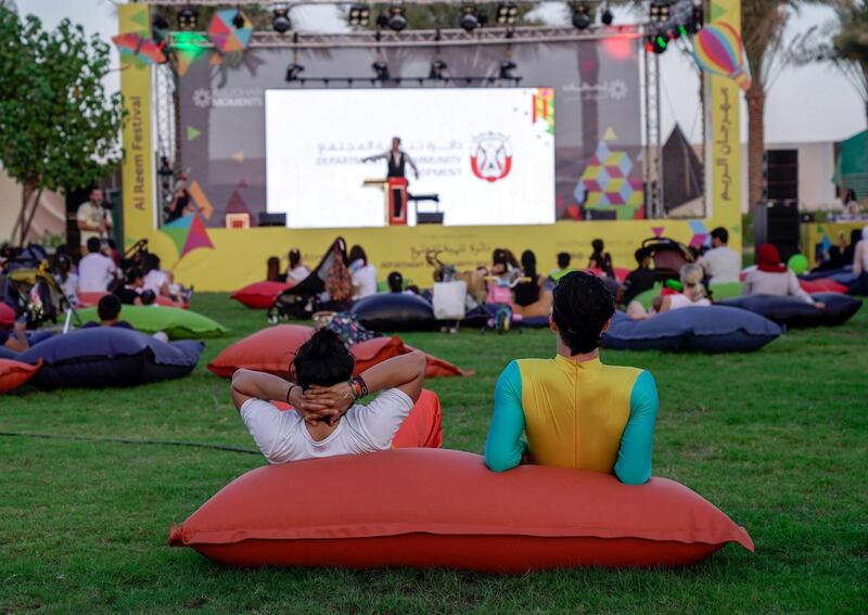 Abu Dhabi, United Arab Emirates, October 17, 2019.  Reem Festival.
-- First day visitors of the Reem 
Festival enjoy a magic show at the Al Reem Central Park.
Victor Besa/The National
Section:  NA
Reporter:  Panna Munyal