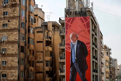 This picture taken on October 15, 2019 shows a giant poster depicting Lebanese Druze Leader Walid Joumblatt hanging along the side of a building in the capital Beirut.  / AFP / JOSEPH EID
