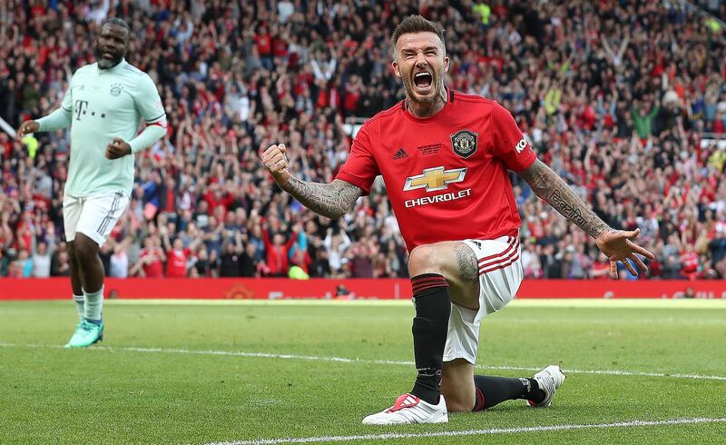 David Beckham celebrates his goal in the 5-0 win for Manchester United Legends against Bayern Munich. PA Sport