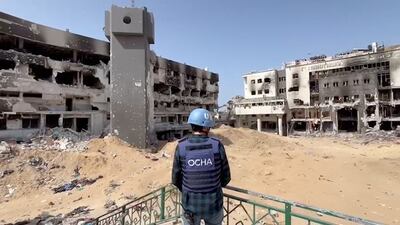UN official Jonathan Whittall stands near the destroyed Al Shifa Hospital in Gaza City. Reuters